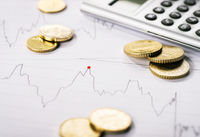 Pièces de monnaie et calculette Les avantages de la sous-location